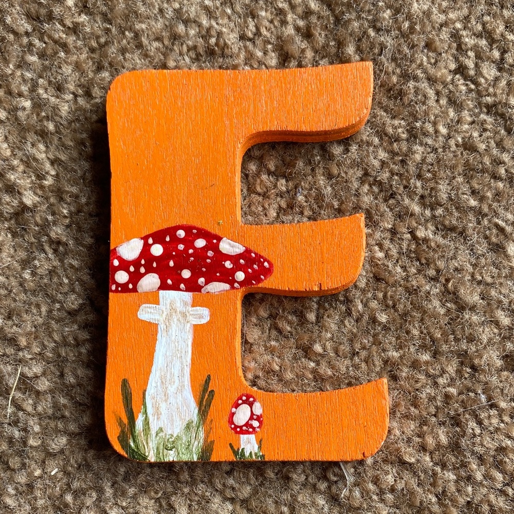 Orange Wooden Letter E with Mushroom Design